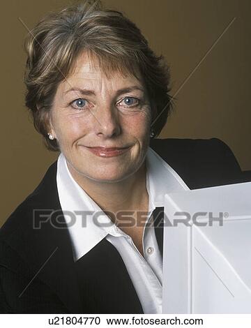 Stock Image - Busy at work. Fotosearch