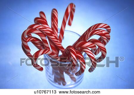 Stock Image - Candy canes in a glass. Fotosearch