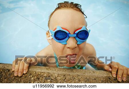 Child in a swimming pool View Large Photo Image Stock Image - Child in a swimming pool. Fotosearch