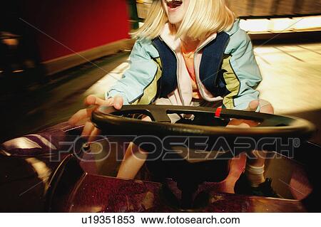 Child on bumper cars View Large Photo Image Stock Image - Child on bumper cars. Fotosearch