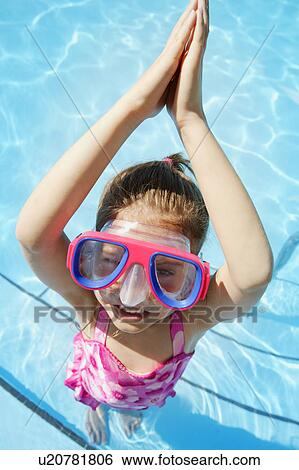 Stock Photograph - Child pretends to dive. Fotosearch