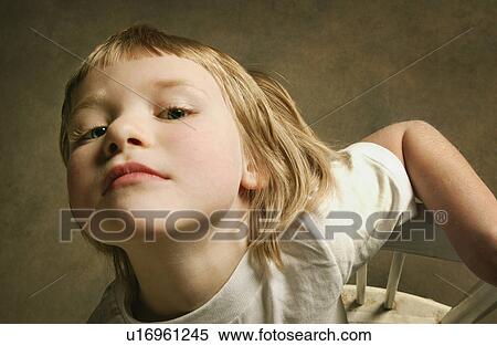 Child with chin up View Large Photo Image Stock Photography - Child with chin up. Fotosearch