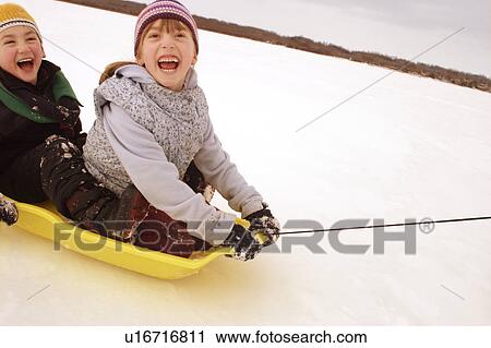 Children on a sled View Large Photo Image Stock Image - Children on a sled. Fotosearch