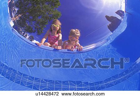 Children peering into a pool View Large Photo Image Stock Image - Children peering into a pool. Fotosearch