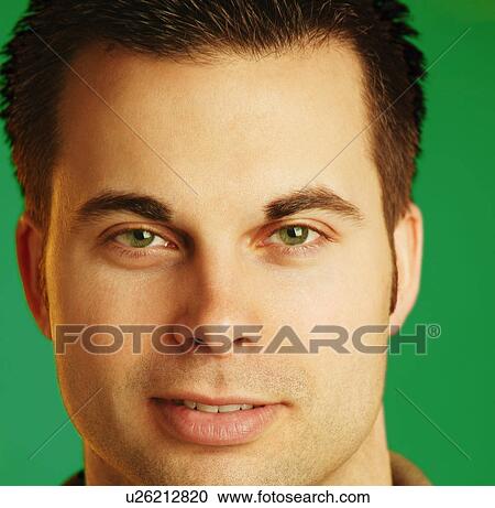 Stock Image - Close up of a man's face. Fotosearch