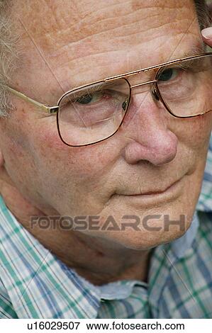 Closeup of a man's face View Large Photo Image Stock Photo - Closeup of a man's face. Fotosearch