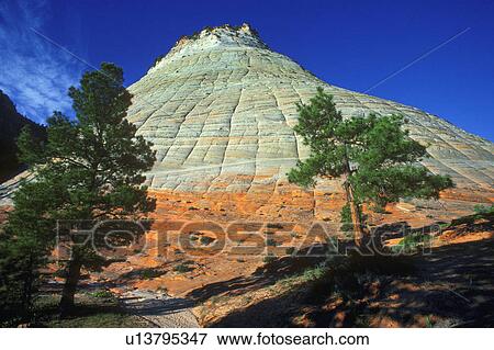 Conical rock formation with red base View Large Photo Image Stock Photo - Conical rock formation with red base. Fotosearch