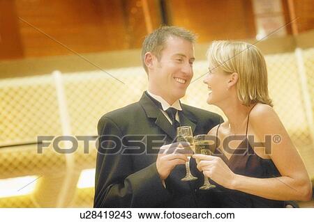 Stock Image - Couple celebrate. Fotosearch