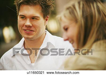 Couple conversation View Large Photo Image Stock Image - Couple conversation. Fotosearch