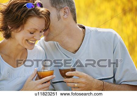 Stock Image - Couple enjoy a special moment. Fotosearch