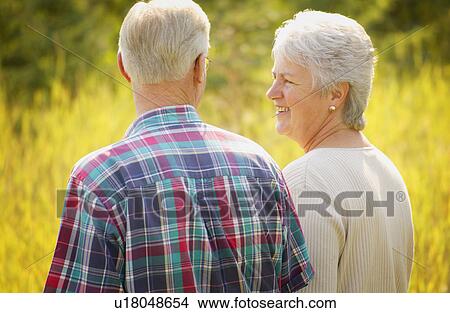 Couple enjoy a walk View Large Photo Image Picture - Couple enjoy a walk. Fotosearch