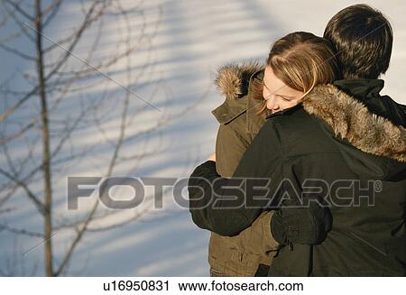 Stock Image - Couple hug. Fotosearch