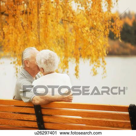 Couple share a kiss View Large Photo Image Stock Image - Couple share a kiss. Fotosearch