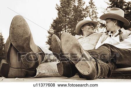 Couple sit together View Large Photo Image Stock Photo - Couple sit together. Fotosearch