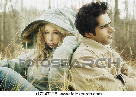 Couple sit together View Large Photo Image Stock Photo - Couple sit together. Fotosearch