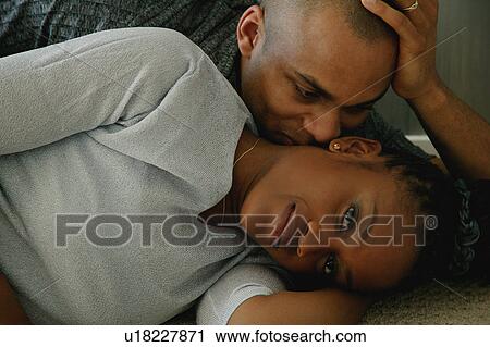 Couple snuggles View Large Photo Image Stock Image - Couple snuggles. Fotosearch