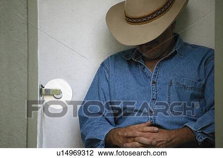 Cowboy in the outhouse View Large Photo Image Stock Image - Cowboy in the outhouse. Fotosearch