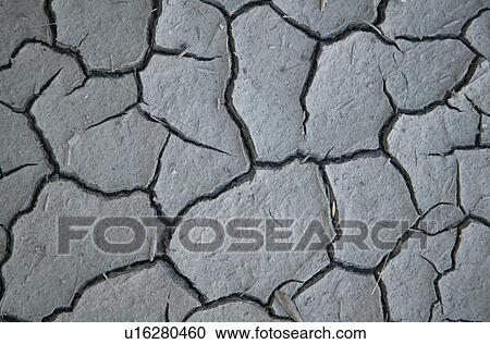 Stock Image - Cracked dirt. Fotosearch