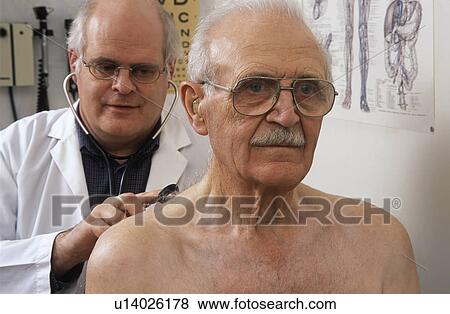 Stock Photo - Doctor examining patient. Fotosearch