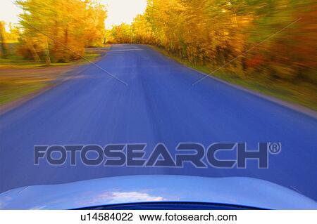 Driving down a scenic road View Large Photo Image Stock Image - Driving down a scenic road. Fotosearch