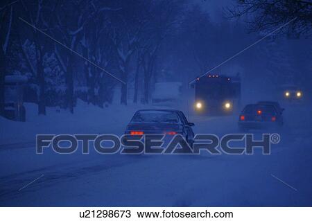 Stock Image - Driving in winter. Fotosearch