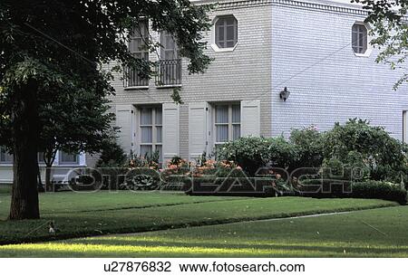 Exterior of a house and gardens View Large Photo Image Stock Image - Exterior of a house and gardens. Fotosearch