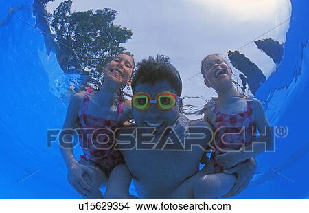 Picture - Family group in swimming pool. Fotosearch