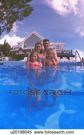 Family picture in a pool View Large Photo Image Stock Photography - Family picture in a pool. Fotosearch