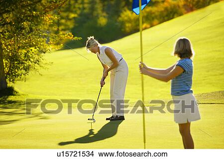 Picture - Female golfers. Fotosearch