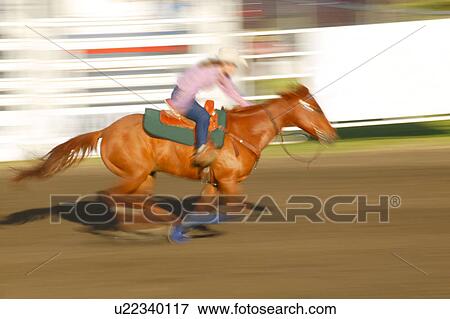 Galloping on horseback View Large Photo Image Stock Photo - Galloping on horseback. Fotosearch