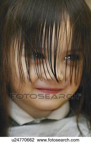 Stock Image - Getting a haircut. Fotosearch