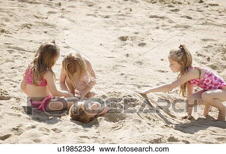 Picture - Getting buried. Fotosearch