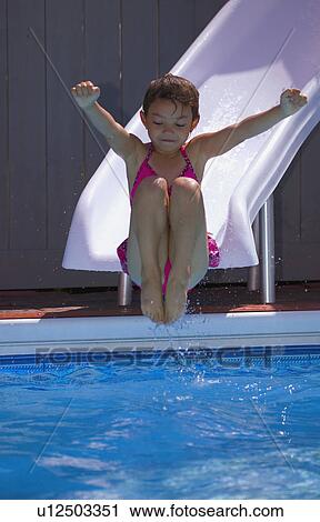 girl on waterslide View Large Photo Image Stock Image - girl on waterslide. Fotosearch