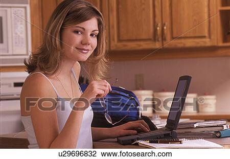 Stock Image - Girl with laptop. Fotosearch