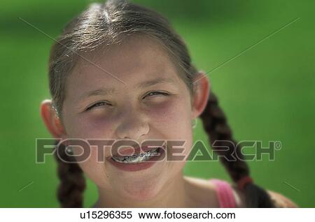 Girl with pigtails View Large Photo Image Stock Photography - Girl with pigtails. Fotosearch