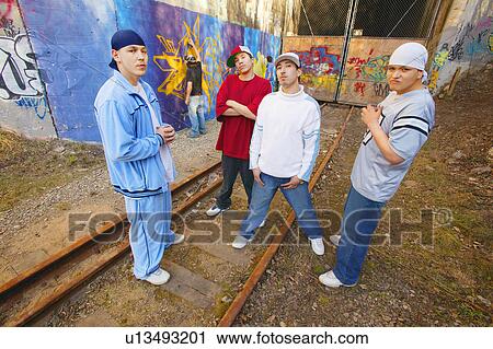 Group of guys hanging out View Large Photo Image Stock Image - Group of guys hanging out. Fotosearch