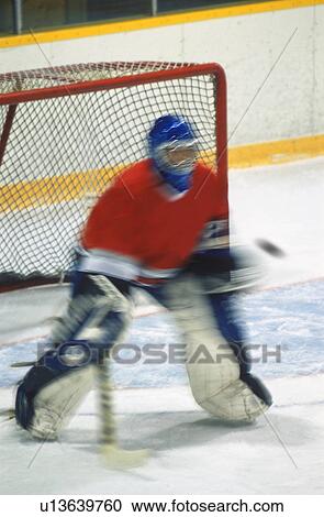 Hockey goalie making save View Large Photo Image Stock Image - Hockey goalie making save. Fotosearch