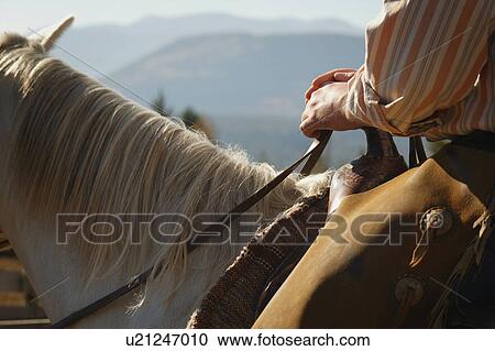 Stock Image - Horseback riding. Fotosearch