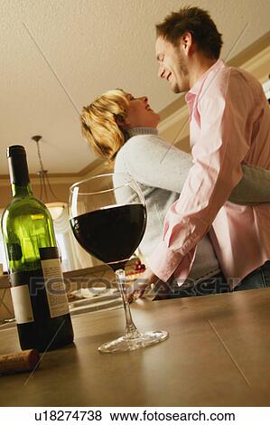 Stock Photo - Hugging looking into eyes. Fotosearch