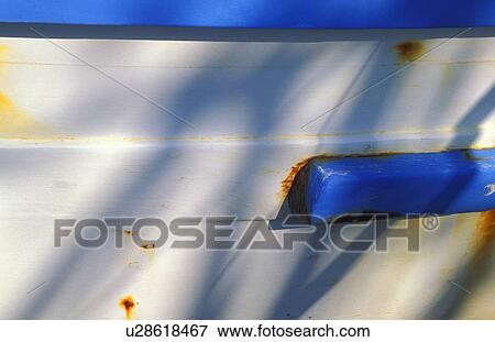 Hull of blue and white boat with corrosion marks View Large Photo Image Stock Photo - Hull of blue and white boat with corrosion marks. Fotosearch