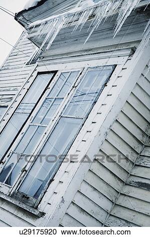 Icicles over a window View Large Photo Image Stock Image - Icicles over a window. Fotosearch