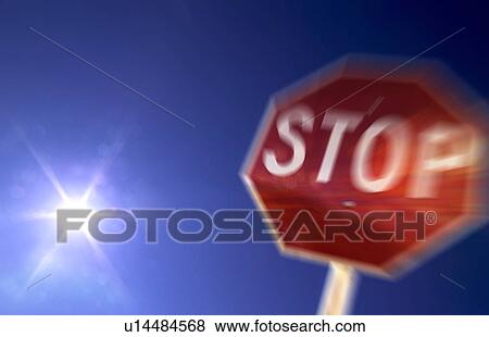 Ignoring a stop sign View Large Photo Image Stock Photo - Ignoring a stop sign. Fotosearch