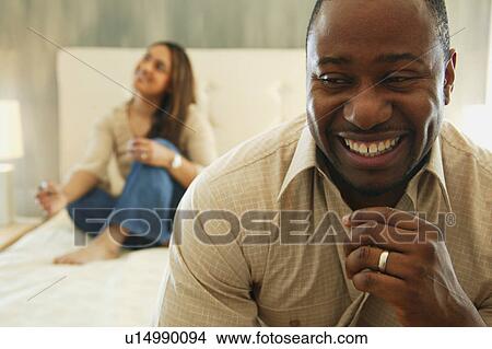 Laughing about it View Large Photo Image Picture - Laughing about it. Fotosearch