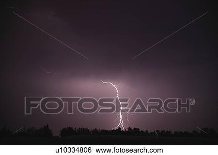Lightning in the sky View Large Photo Image Stock Photograph - Lightning in the sky. Fotosearch