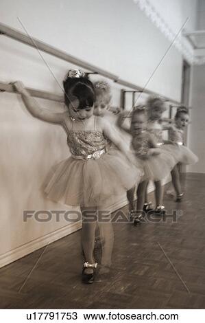 Little girls practice at Ballet class View Large Photo Image Stock Image - Little girls practice at Ballet class. Fotosearch