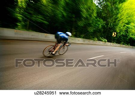Lone cyclist View Large Photo Image Stock Image - Lone cyclist. Fotosearch