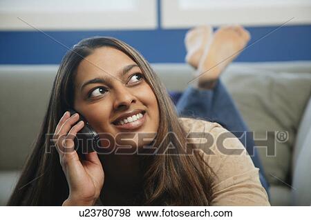 Stock Photo - Long chatty phone call. Fotosearch