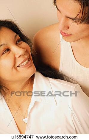 Looking at each other View Large Photo Image Stock Photo - Looking at each other. Fotosearch