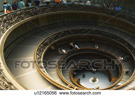 Stock Photograph - Looking Down at Staircase in The Vatican Museum Vatican City Rome Italy . Fotosearch
