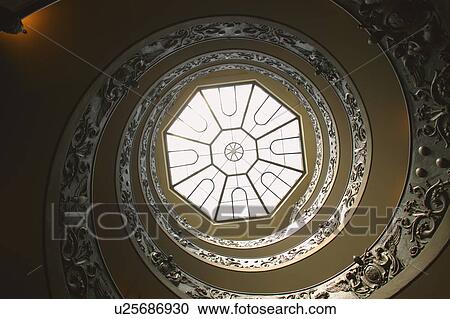 Stock Image - Looking up at Staircase in The Vatican Museum Vatican City Rome Italy . Fotosearch